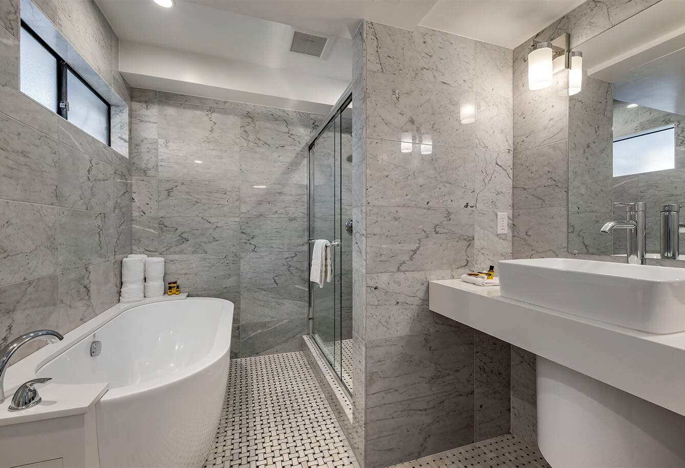 Bathroom with separate bathtub and walk-in shower