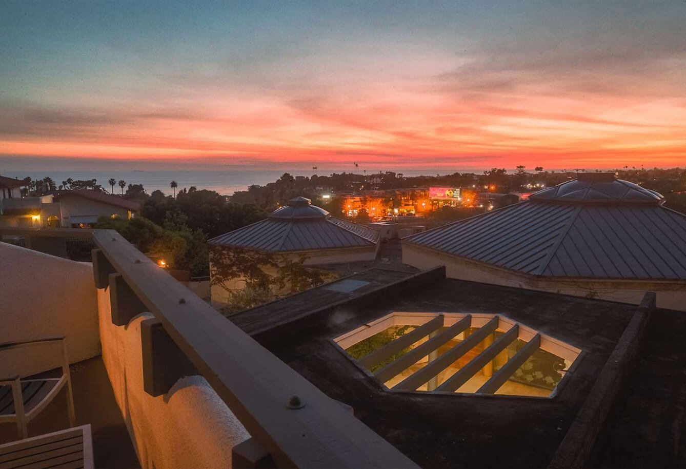 Balcony view of a sunset over the ocean