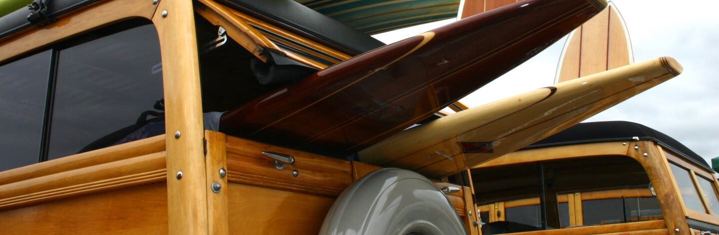 Woodie station wagon with surfboards